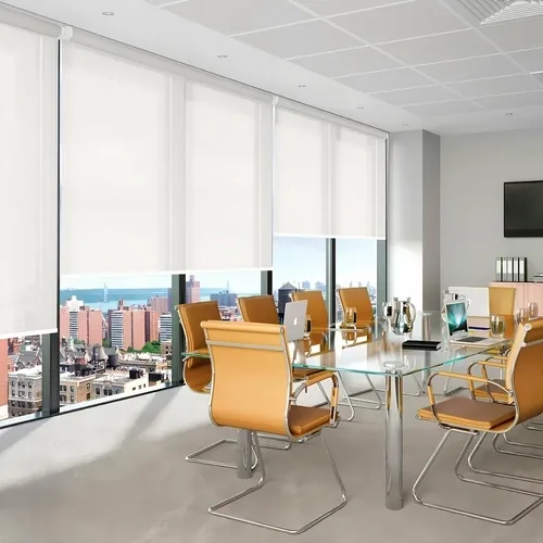 White roller blinds fitted in a boardroom